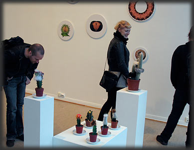 people viewing my Cute Parasite exhibition in Norway